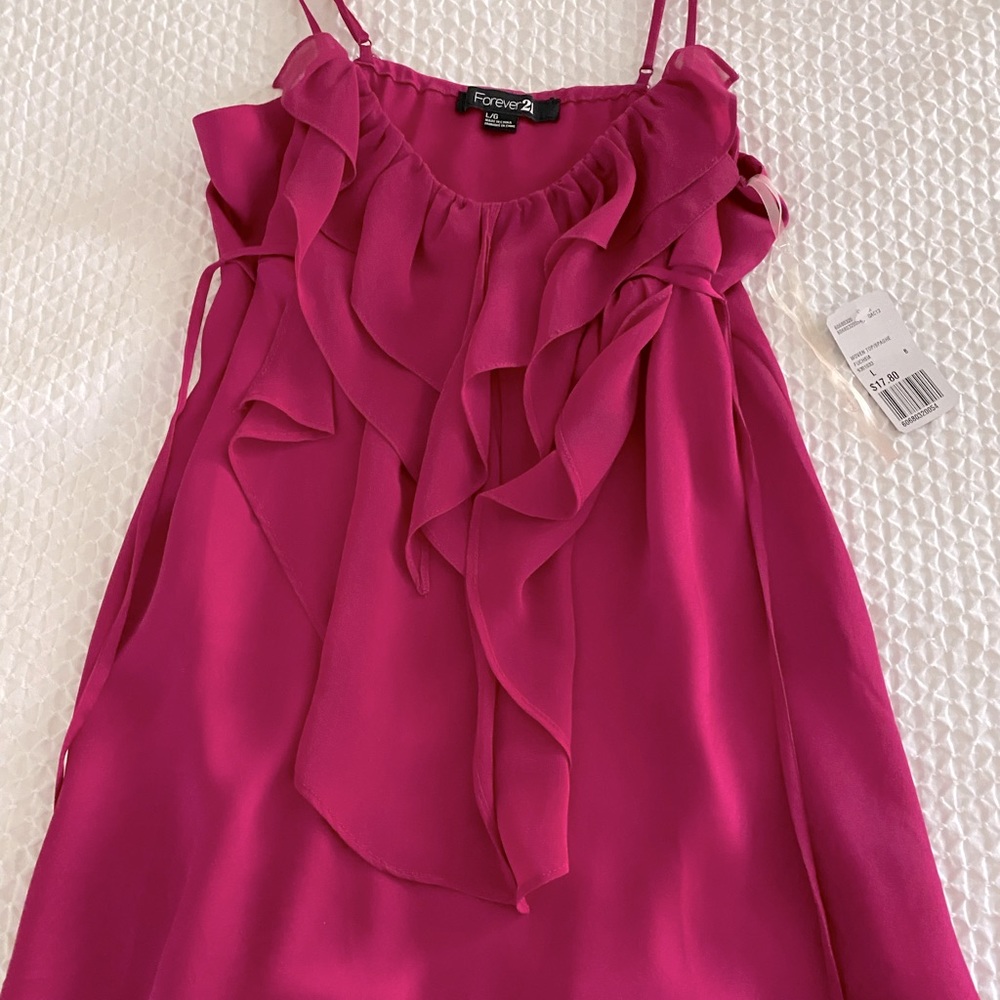 Brand new pink top for spring summer. King length and adjustable straps.